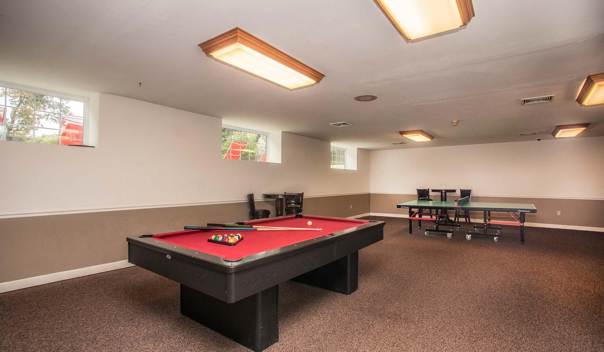 Pool tables are located in the clubhouse