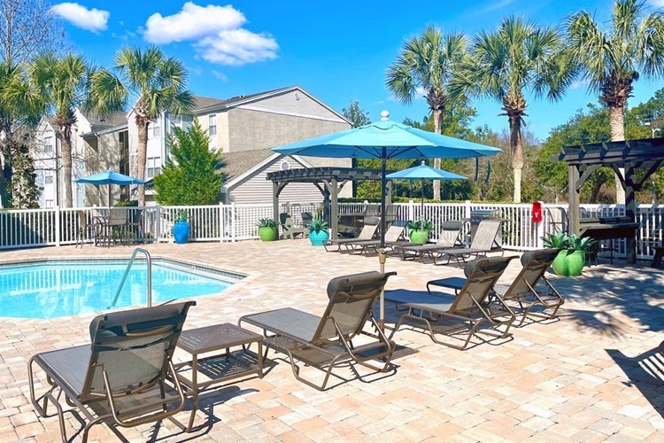 Our expansive sundeck includes plenty of seating options for you to relax by the pool.