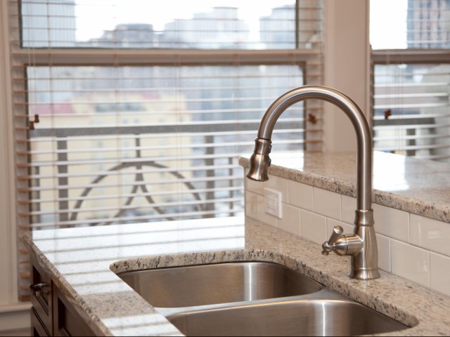Granite Surfaces and Deep Sinks in Kitchens