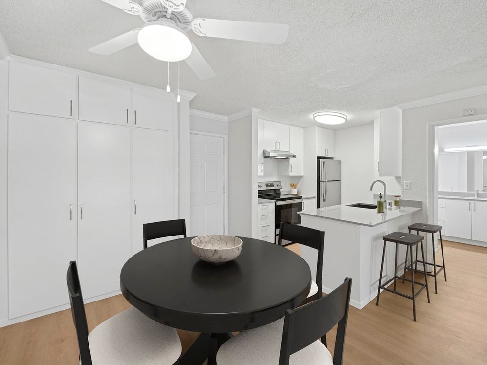 Renovated Package I kitchen and dining area with hard surface flooring