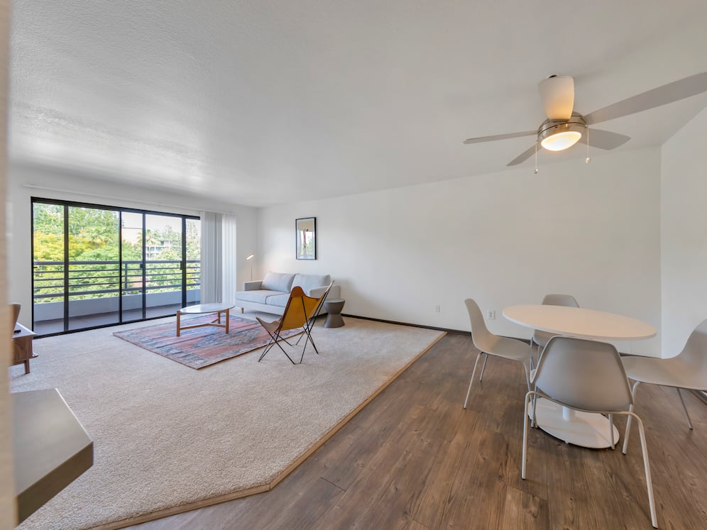 Furnished+ apartment homes include a dining set (Representative Image – exact items and style of furnishings may vary)