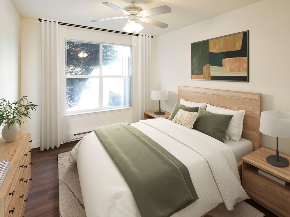 Bedroom with hard surface flooring (select homes)