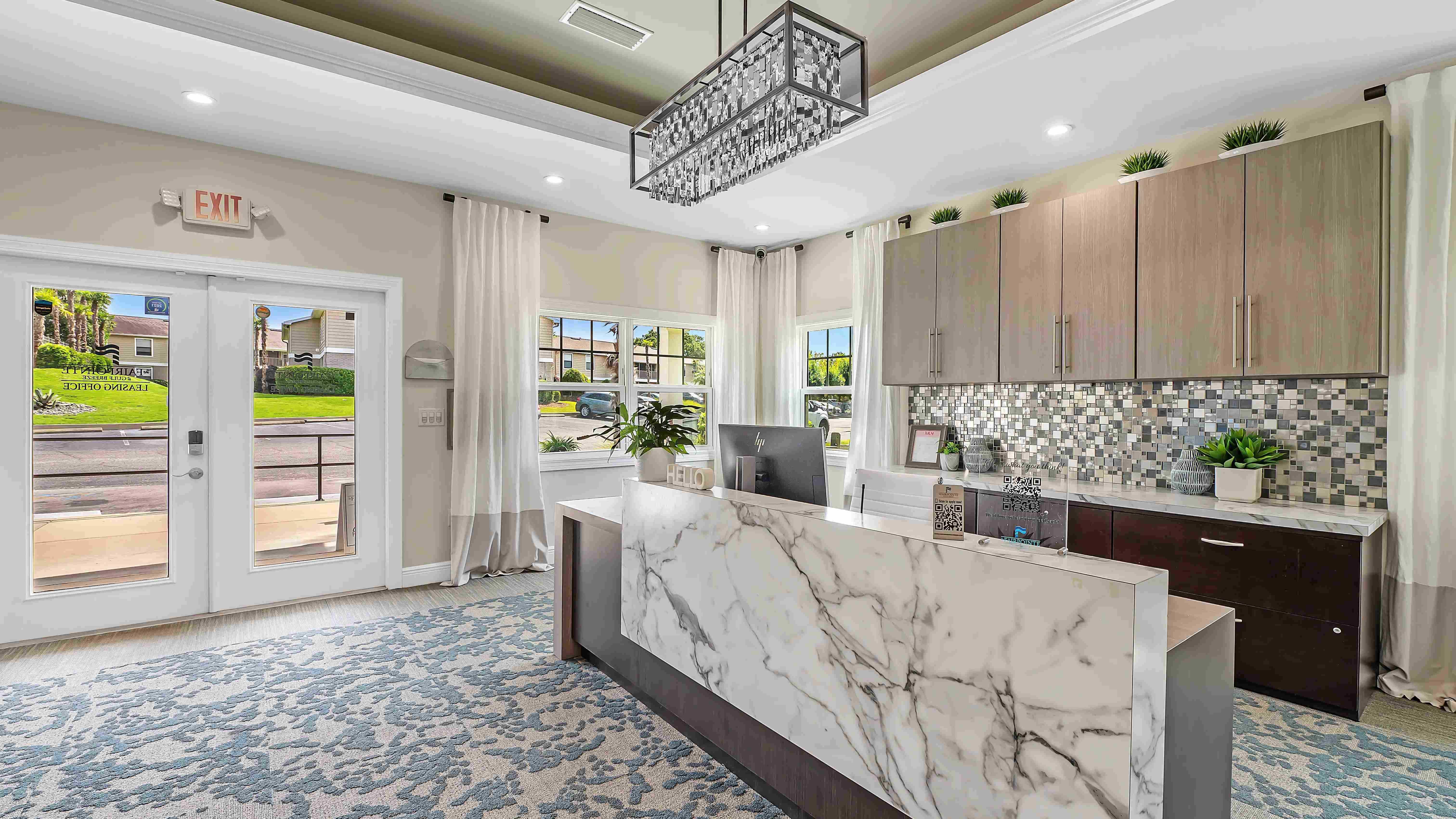 Experience style and grace in our meticulously styled leasing office, offering a panoramic view of our exquisite community.