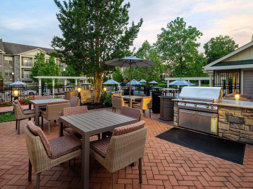 Courtyard with barbeque grills and picnic seating
