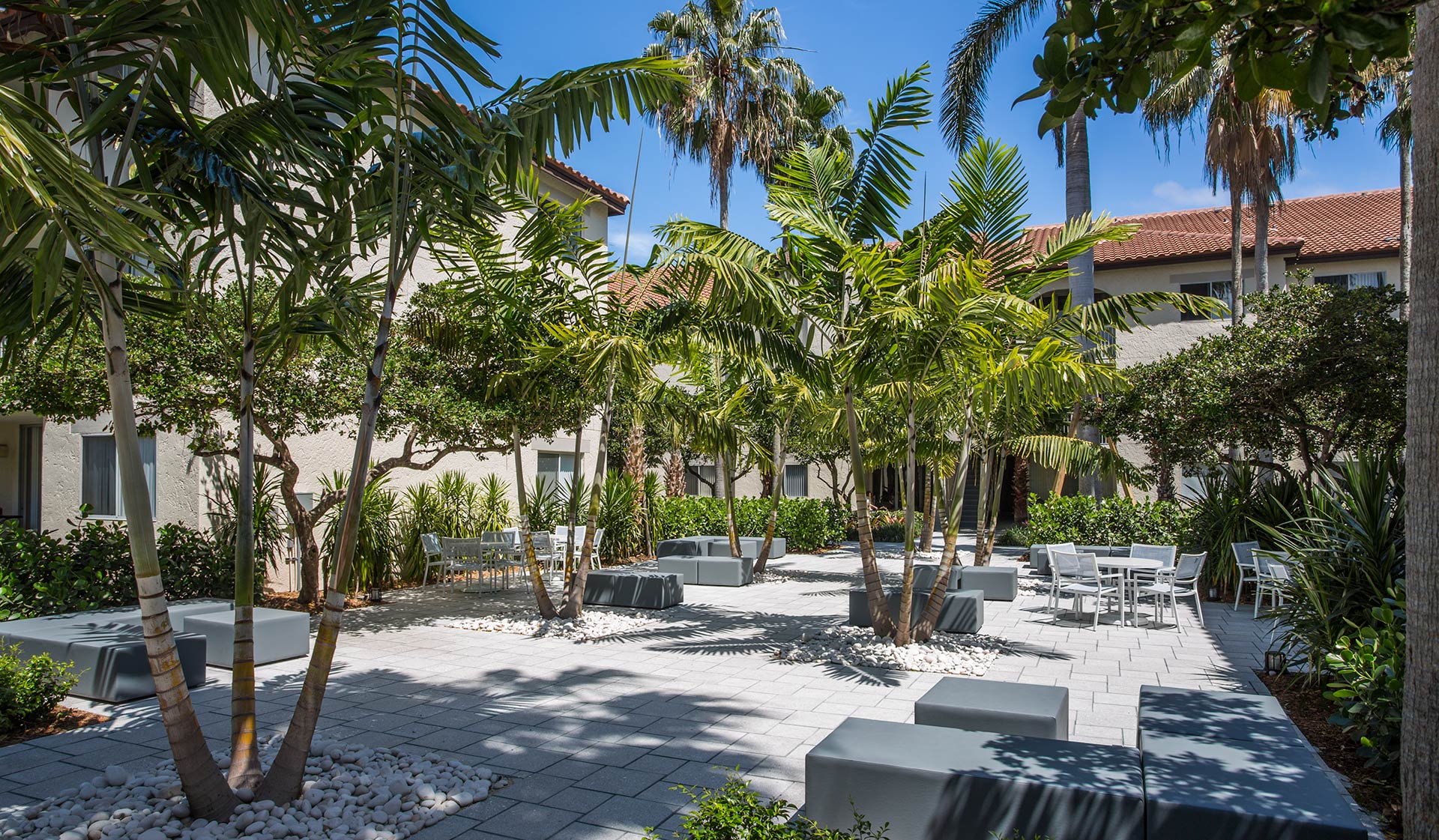 Lush landscaping and fountains throughout
