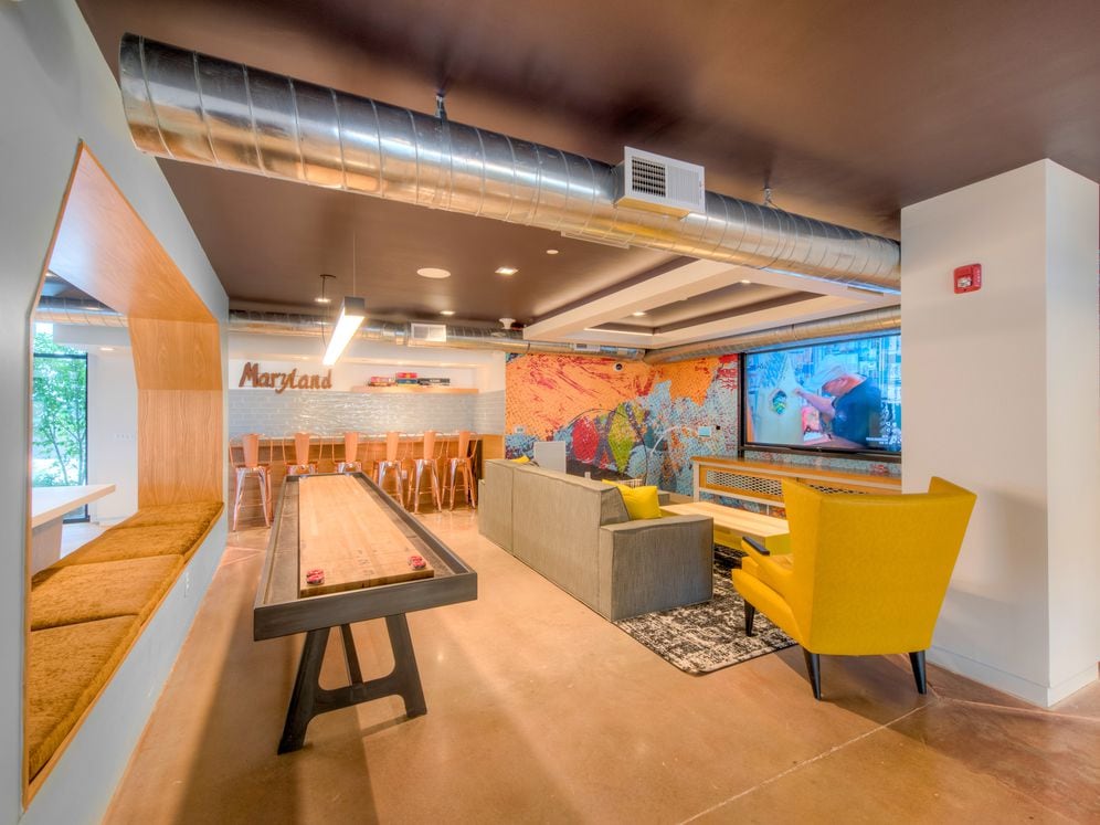 Chill lounge with shuffleboard, lounge seating and flatscreen TV