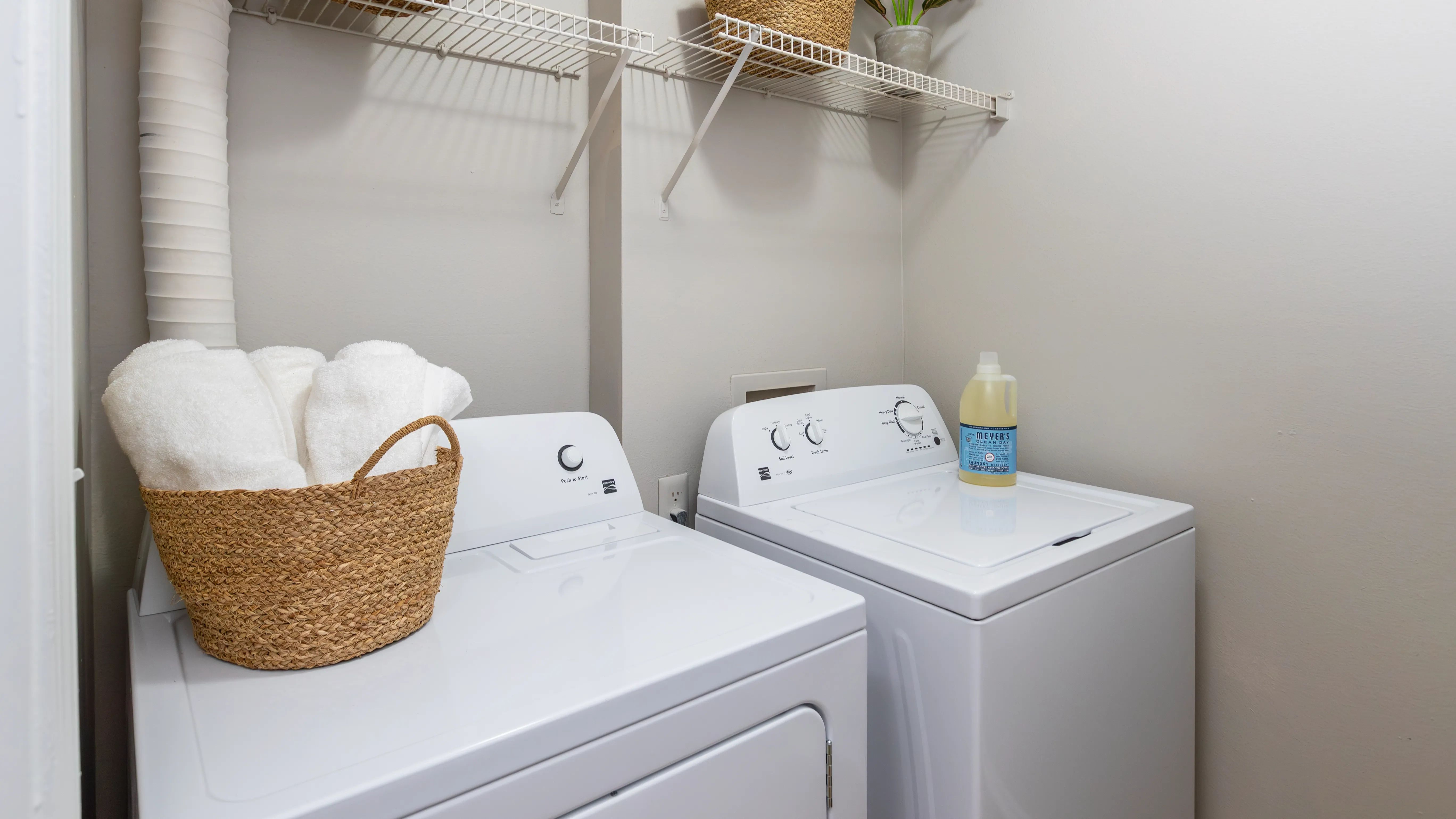 Enjoy the ease of doing laundry from the comfort of your own apartment with an in-unit washer and dryer, plus added shelving for storage.