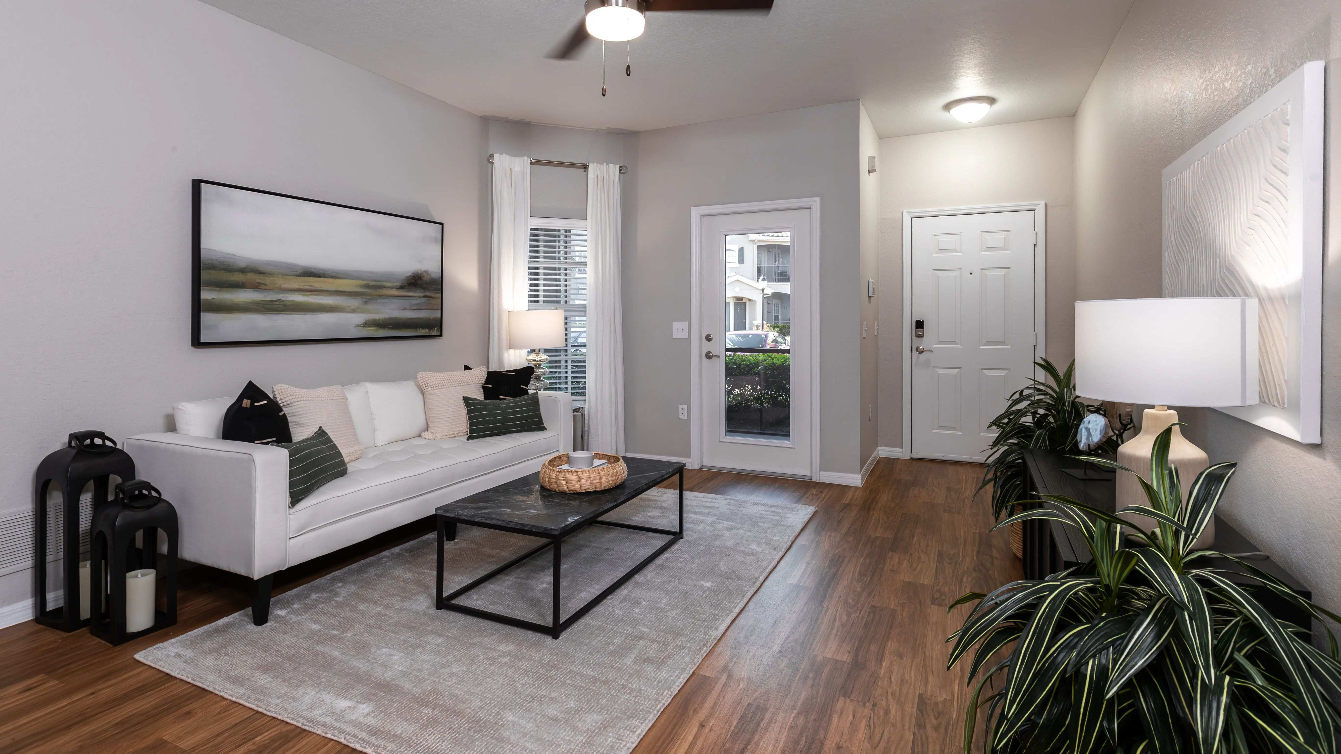 A sophisticated living space with stylish decor, a neutral color palette, and an inviting atmosphere.