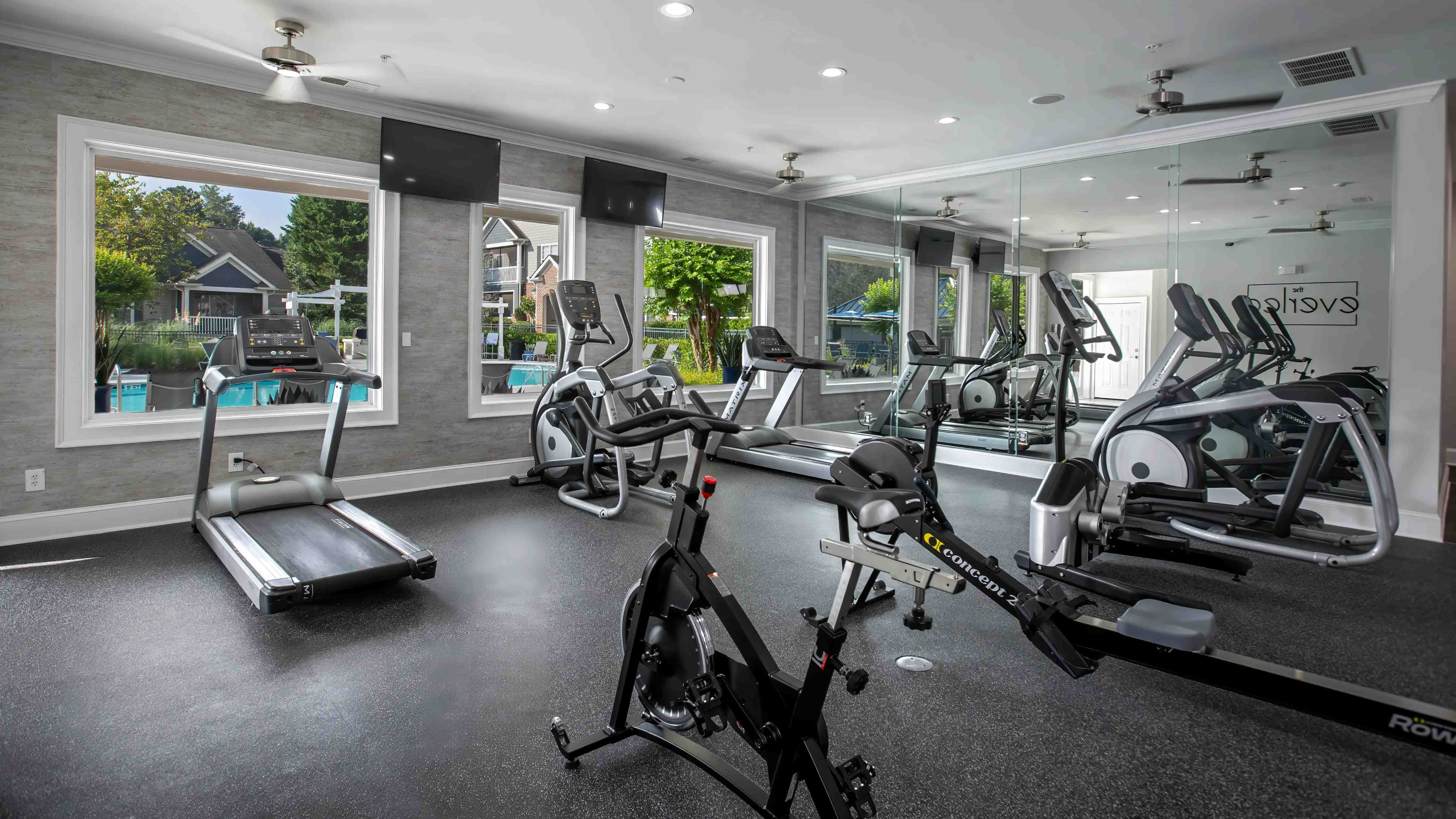 Explore a cutting-edge workout facility featuring state-of-the-art equipment for a full-body fitness journey. 