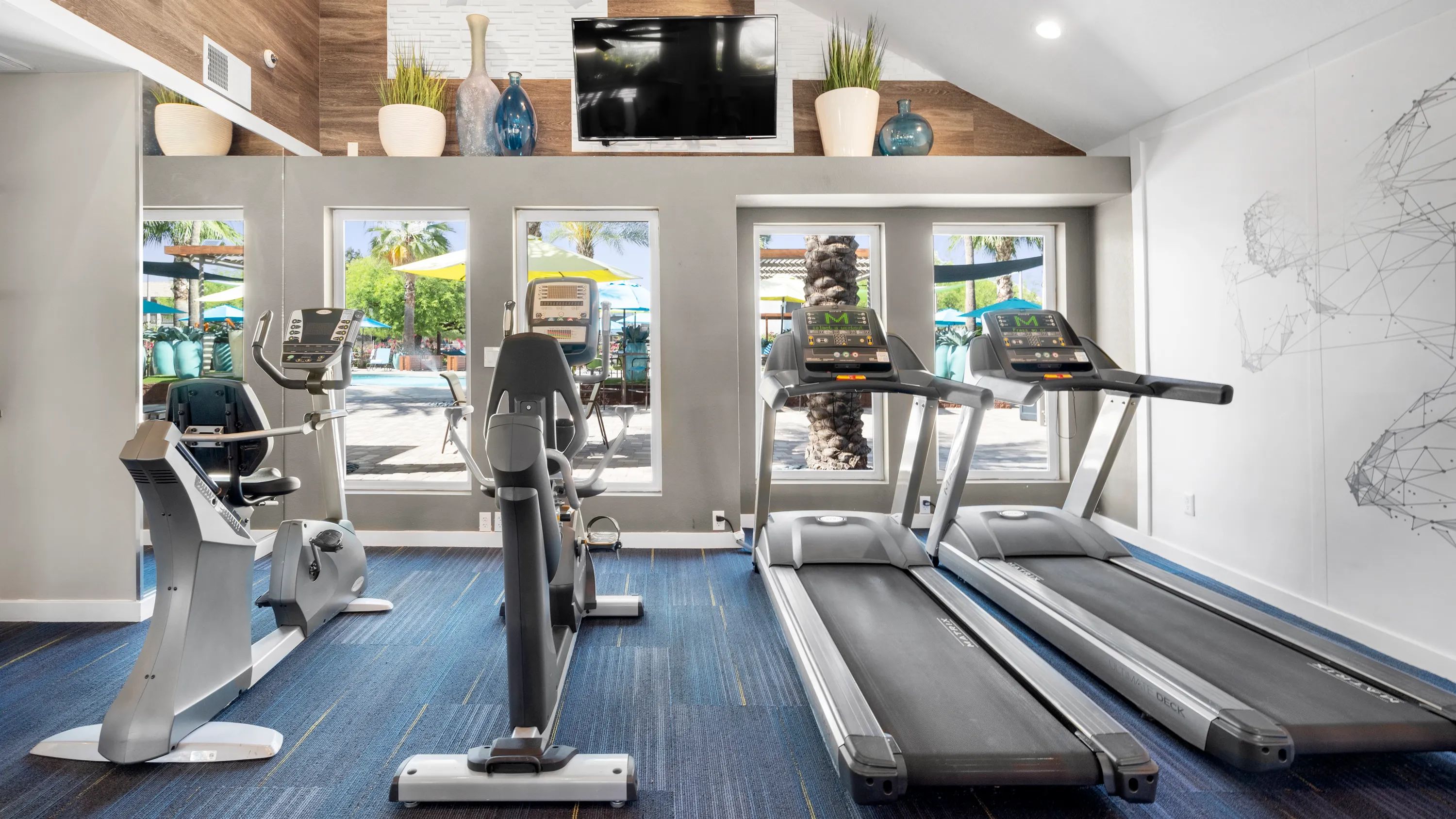 Energize your fitness routine with state-of-the-art cardio equipment in a vibrant fitness setting. 