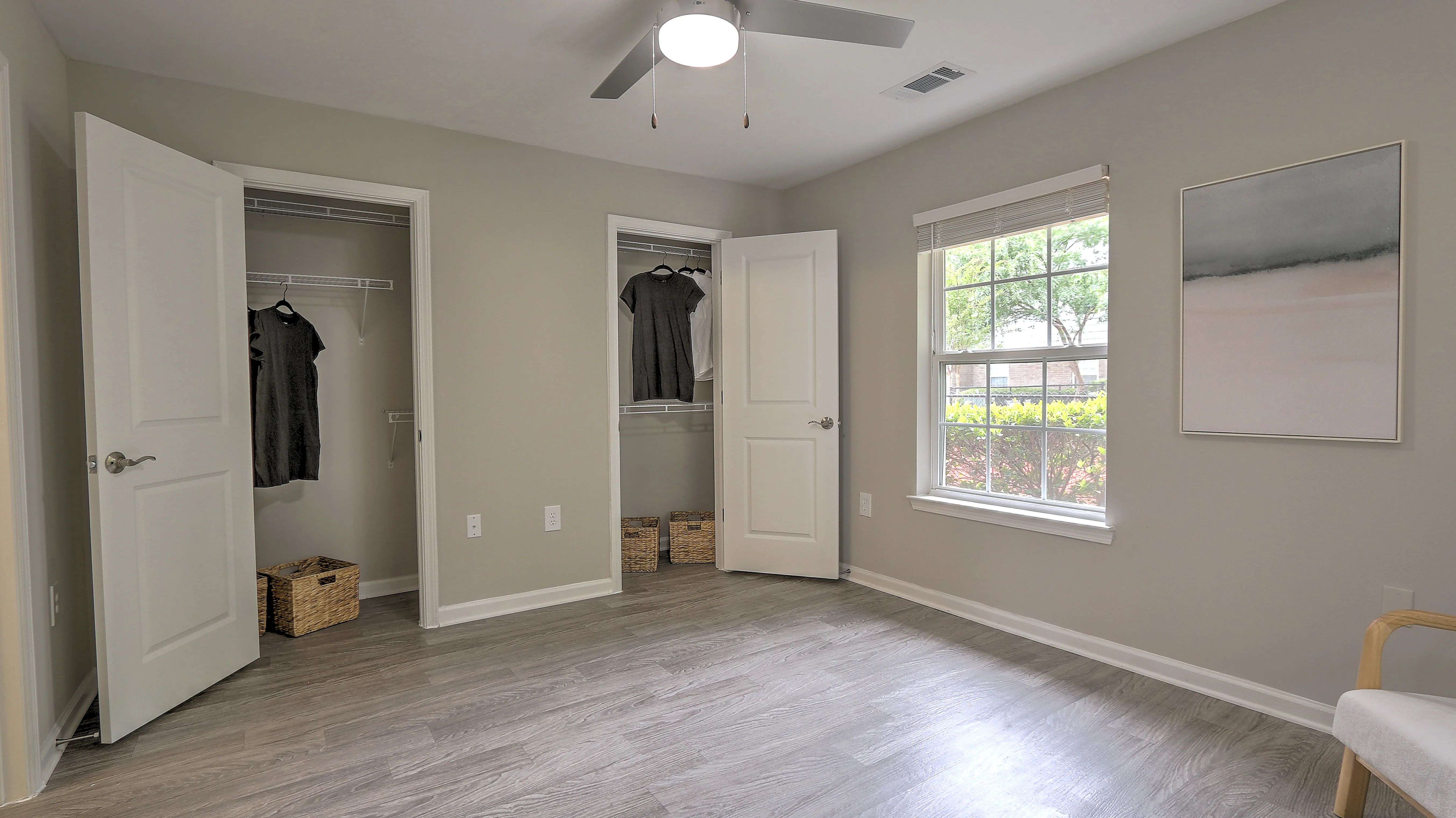 Primary suites feature double walk-in closets with built-in organizers.