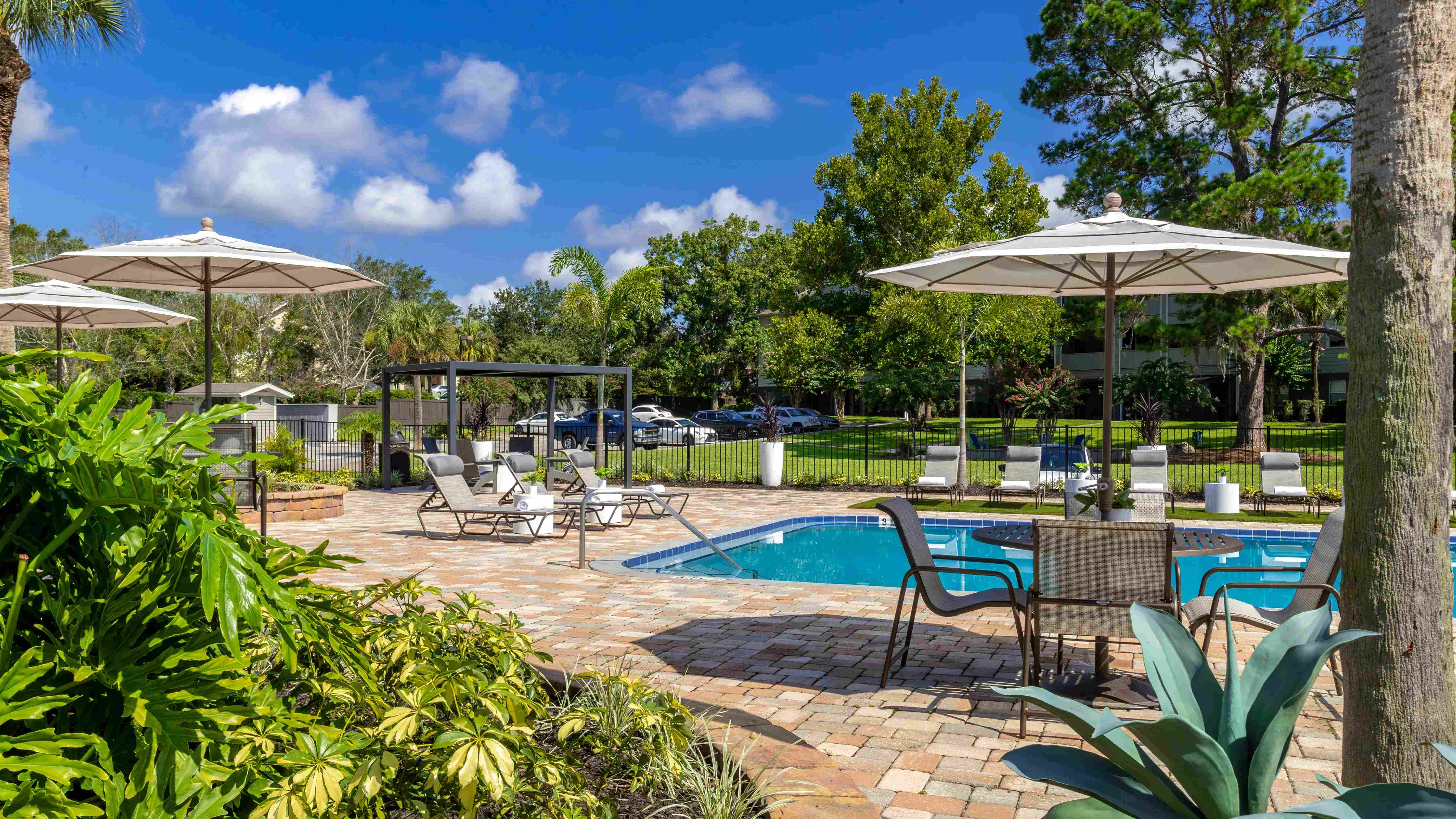 Our sundeck offers diverse seating options, including a pergola, umbrella-covered tables, and sun loungers—choose your comfort. 