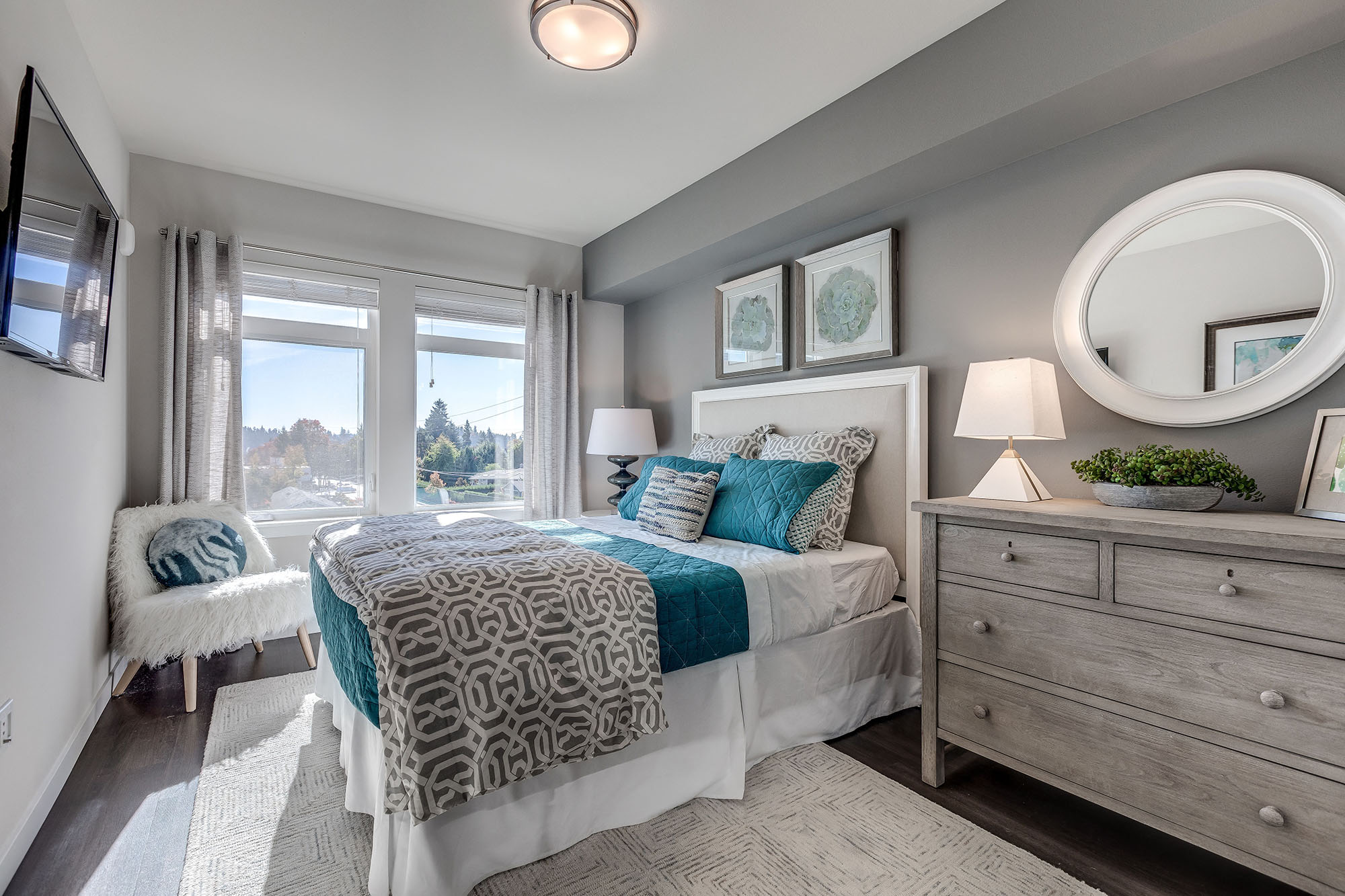 Lux apartments have large bedroom spaces with plenty of natural light and ample space for a queen-sized bed and dresser