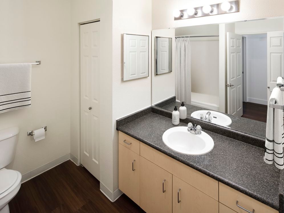 Bath with hard surface flooring (select homes)