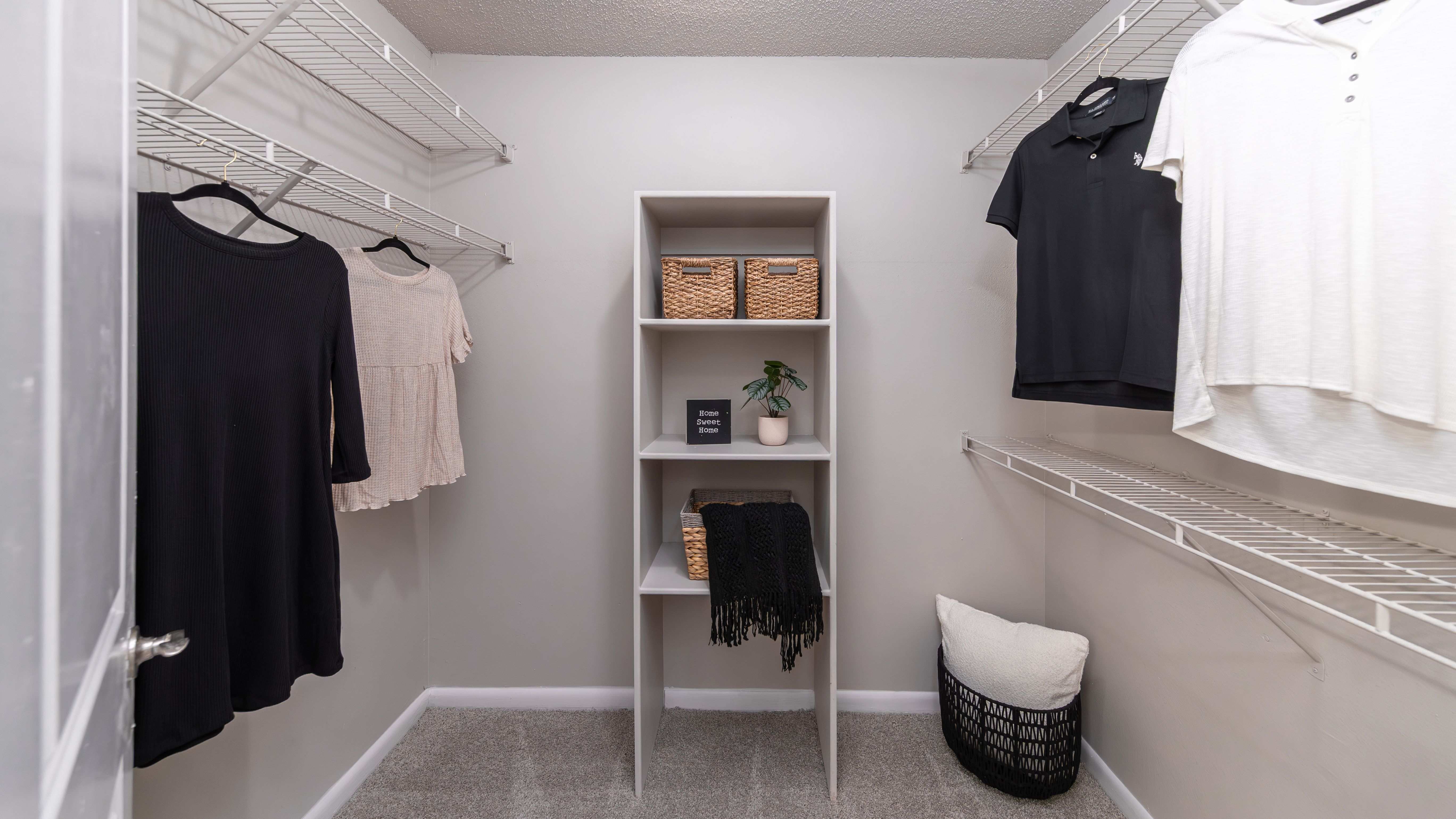 Maximize your storage potential with our thoughtfully designed walk-in closets, complete with built-in shelving.