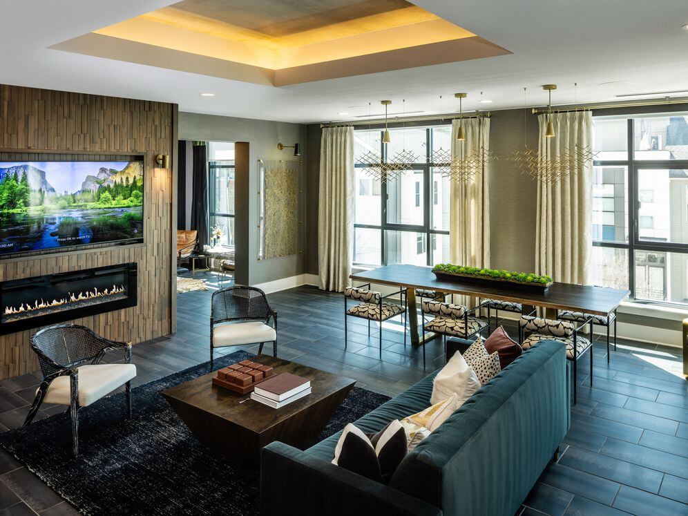 Lounge with fireplace and TV