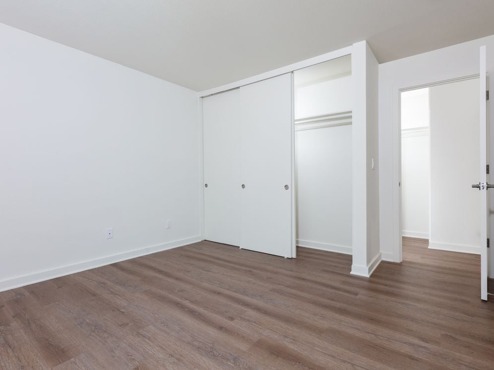 Bedroom with hard surface flooring