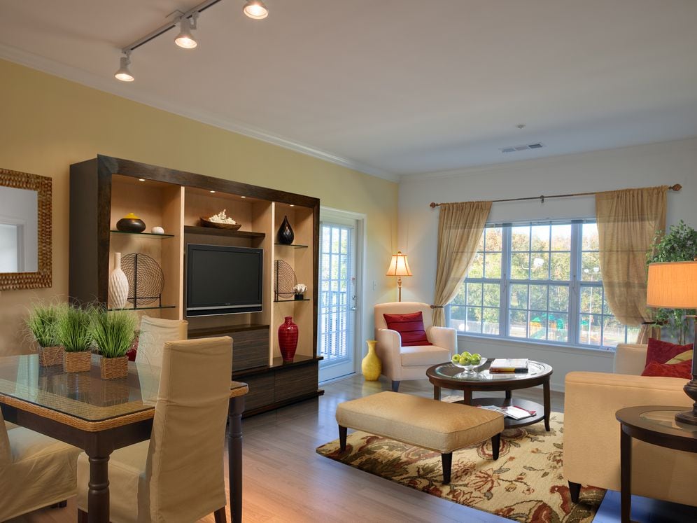 Classic Package living and dining area with hard surface flooring