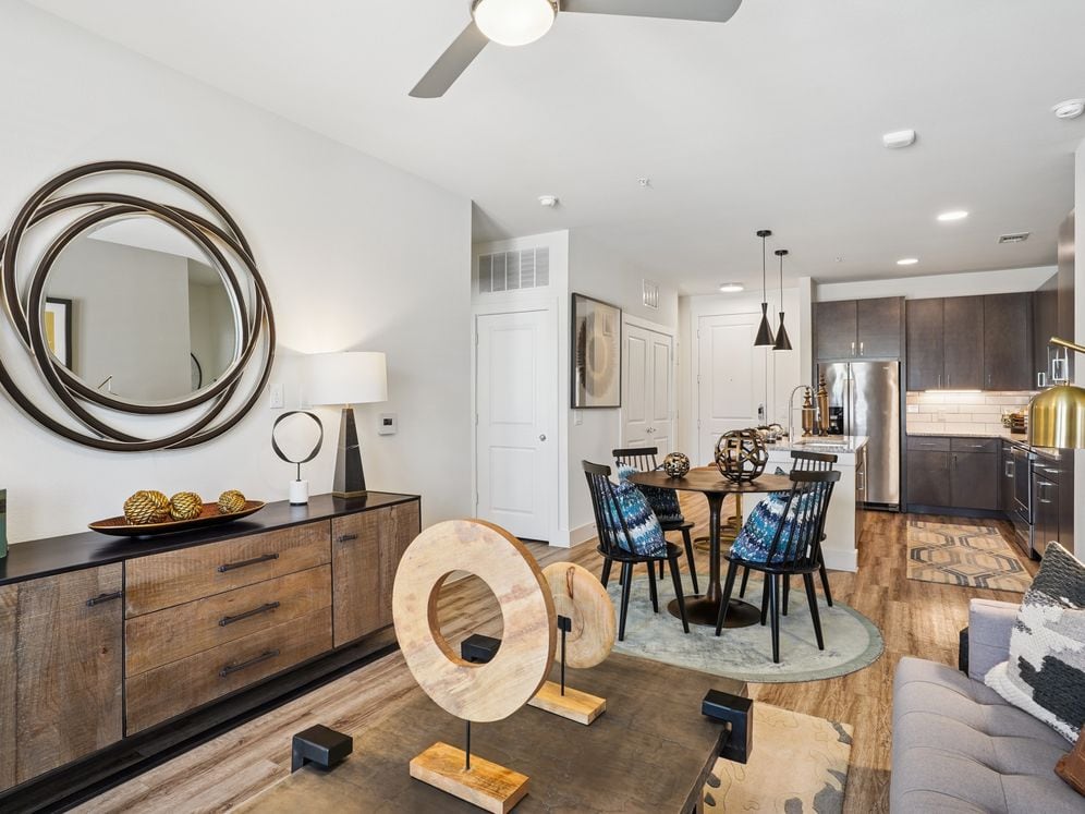 Kitchen, living, and dining area with hard surface flooring