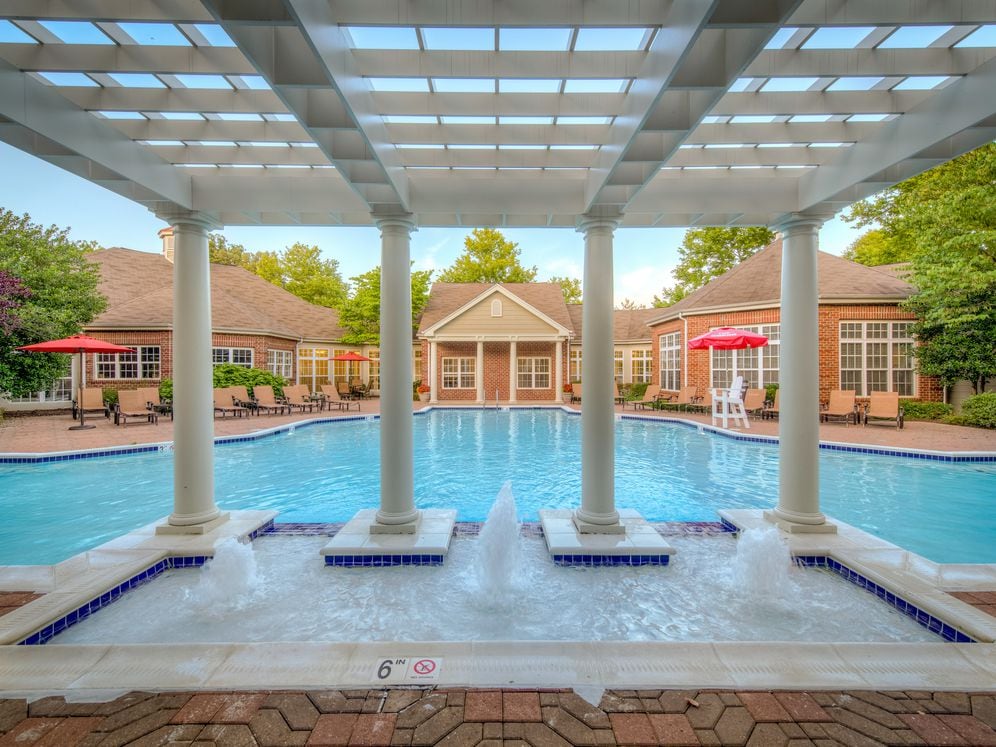 Swimming pool and sundeck with lounge seating