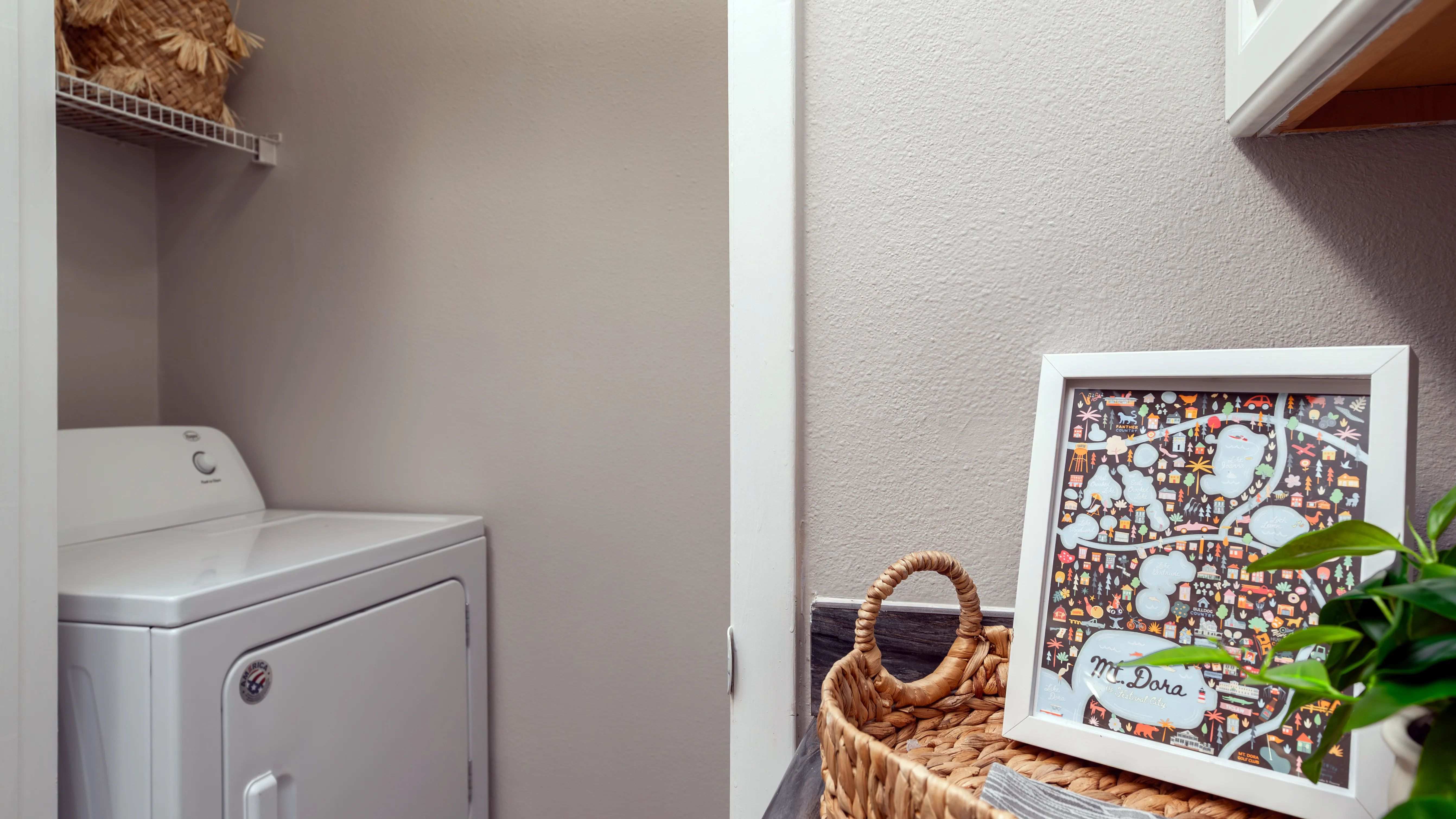 All apartment homes include a full-size washer and dryer in a private laundry nook featuring built-in shelving.