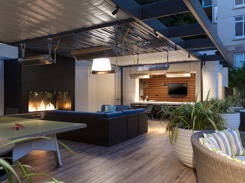 Outdoor Lounge with Fireplace Lounge Seating and Game Tables