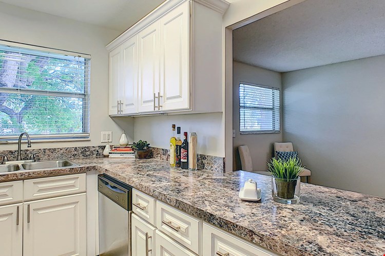 Savor the pleasures of cooking with our stainless steel appliances and the elegance of granite-like countertops. It's time to fall in love with your kitchen!
