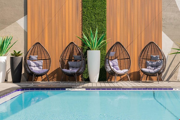 Sit back in one of our comfortable chairs while watching the kids play in the pool.