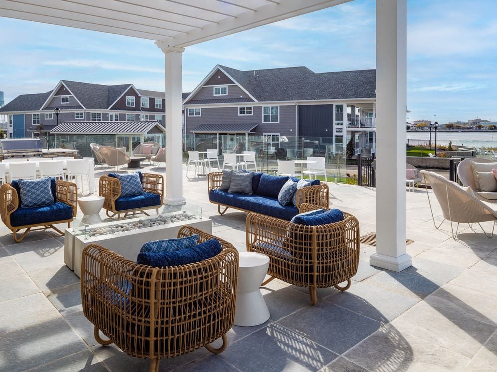 Courtyard with lounge seating and fireplace