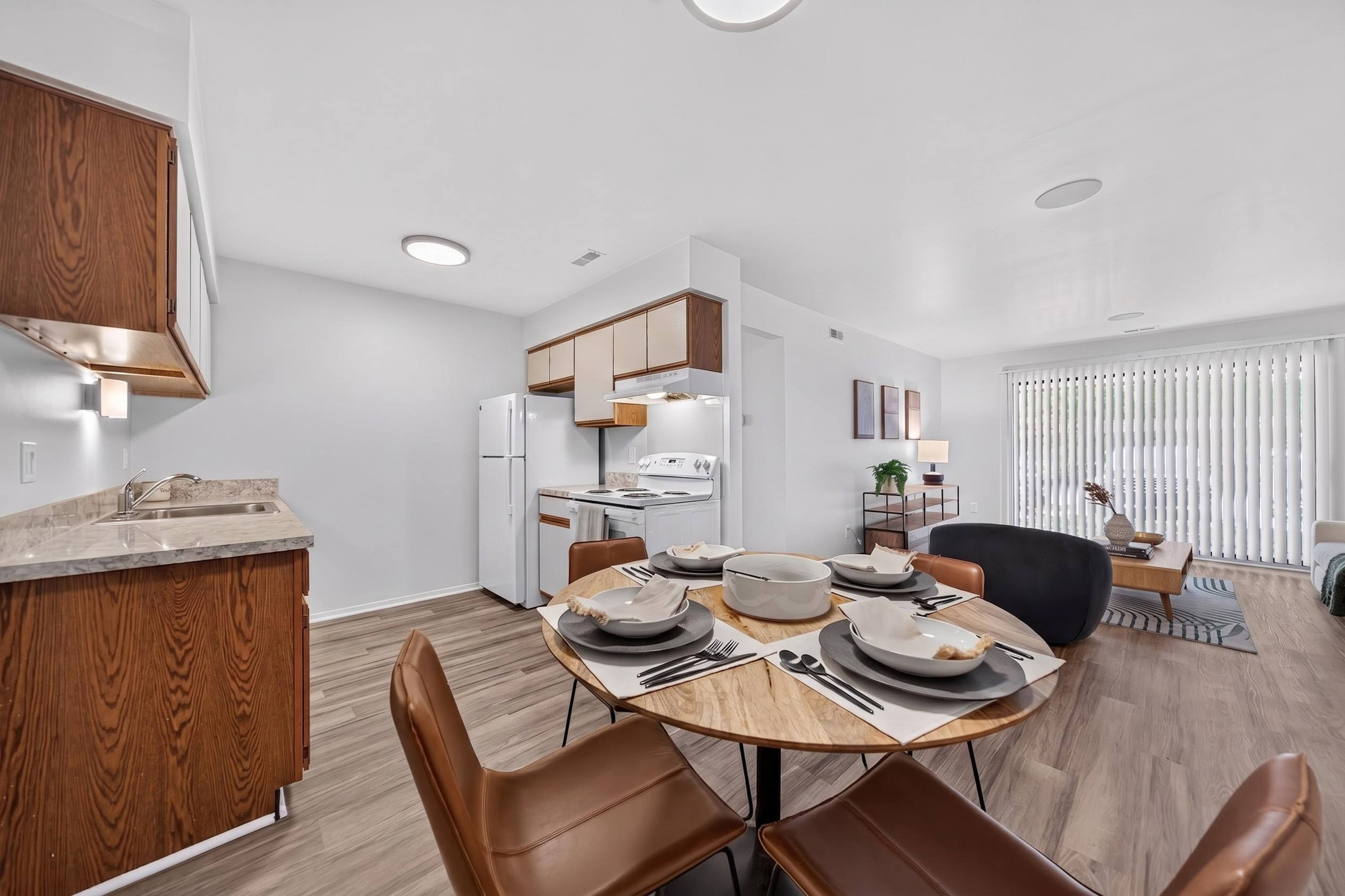 Open Concept Living-Dining at Lakeside Village Apartments in Clinton Township, MI
