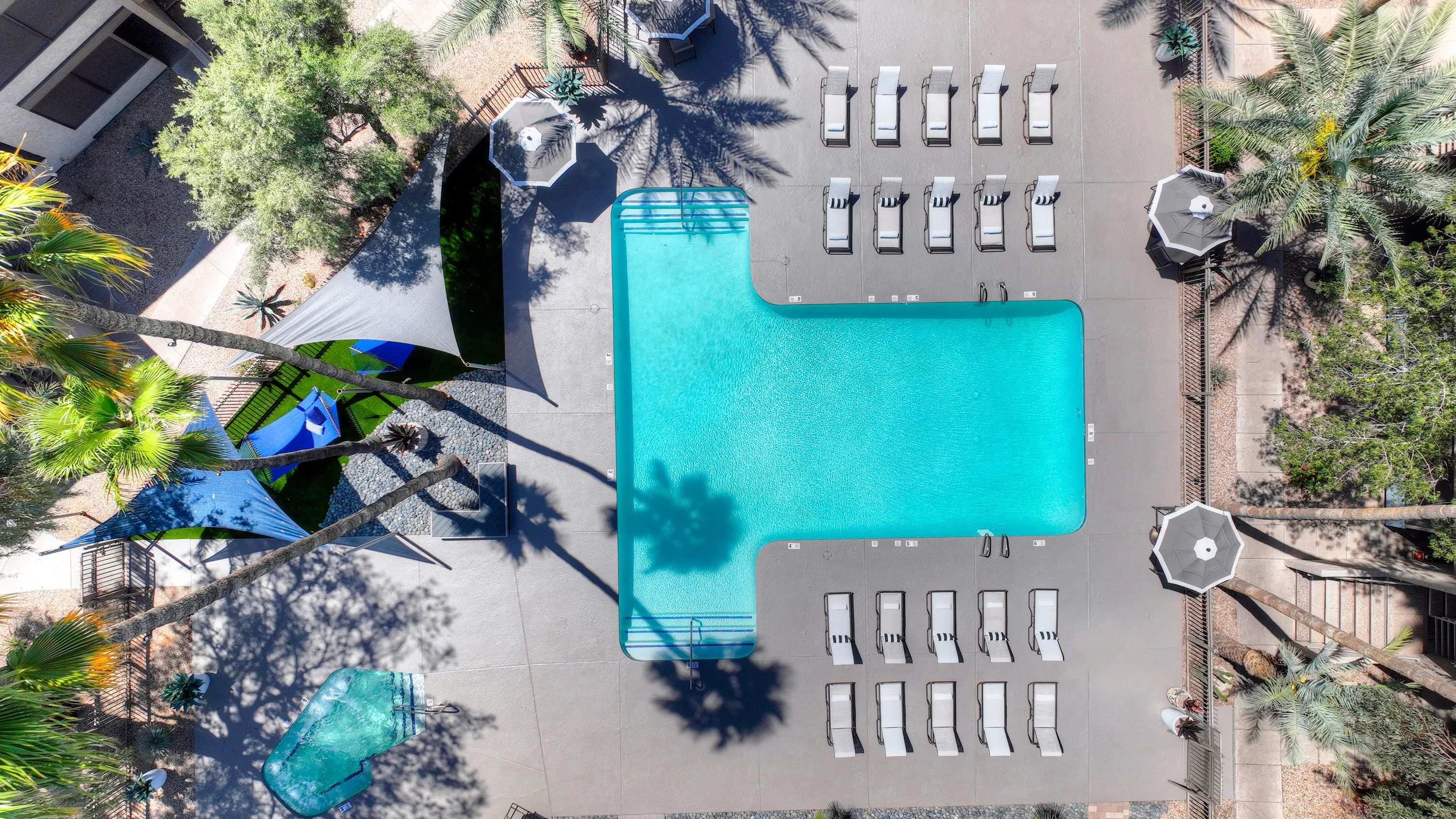 Take in the stunning aerial view of Beacon at 601's sparkling pool and sprawling sundeck. It's the perfect place to cool off, relax, and have fun in the sun.