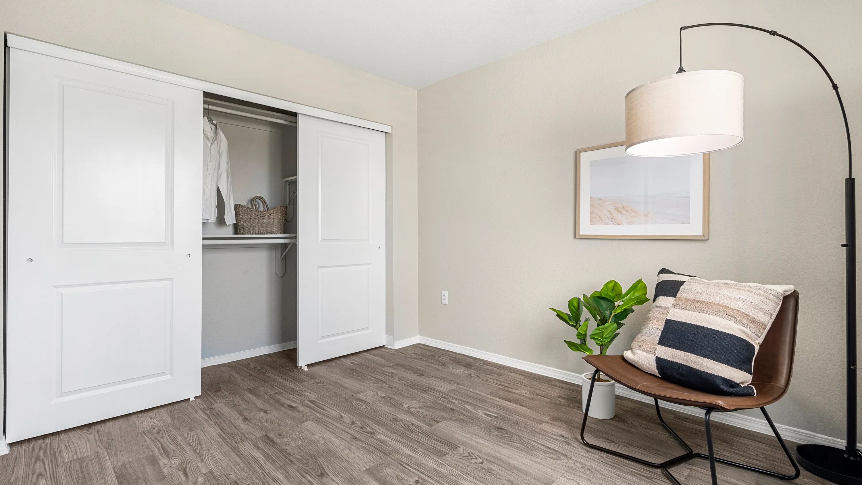 Step into your generous closet space, complete with sliding doors and the tidiest of shelving. It's organization made oh-so-easy! 