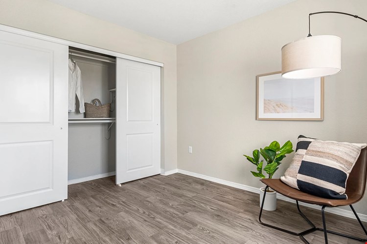 Step into your generous closet space, complete with sliding doors and the tidiest of shelving. It's organization made oh-so-easy!