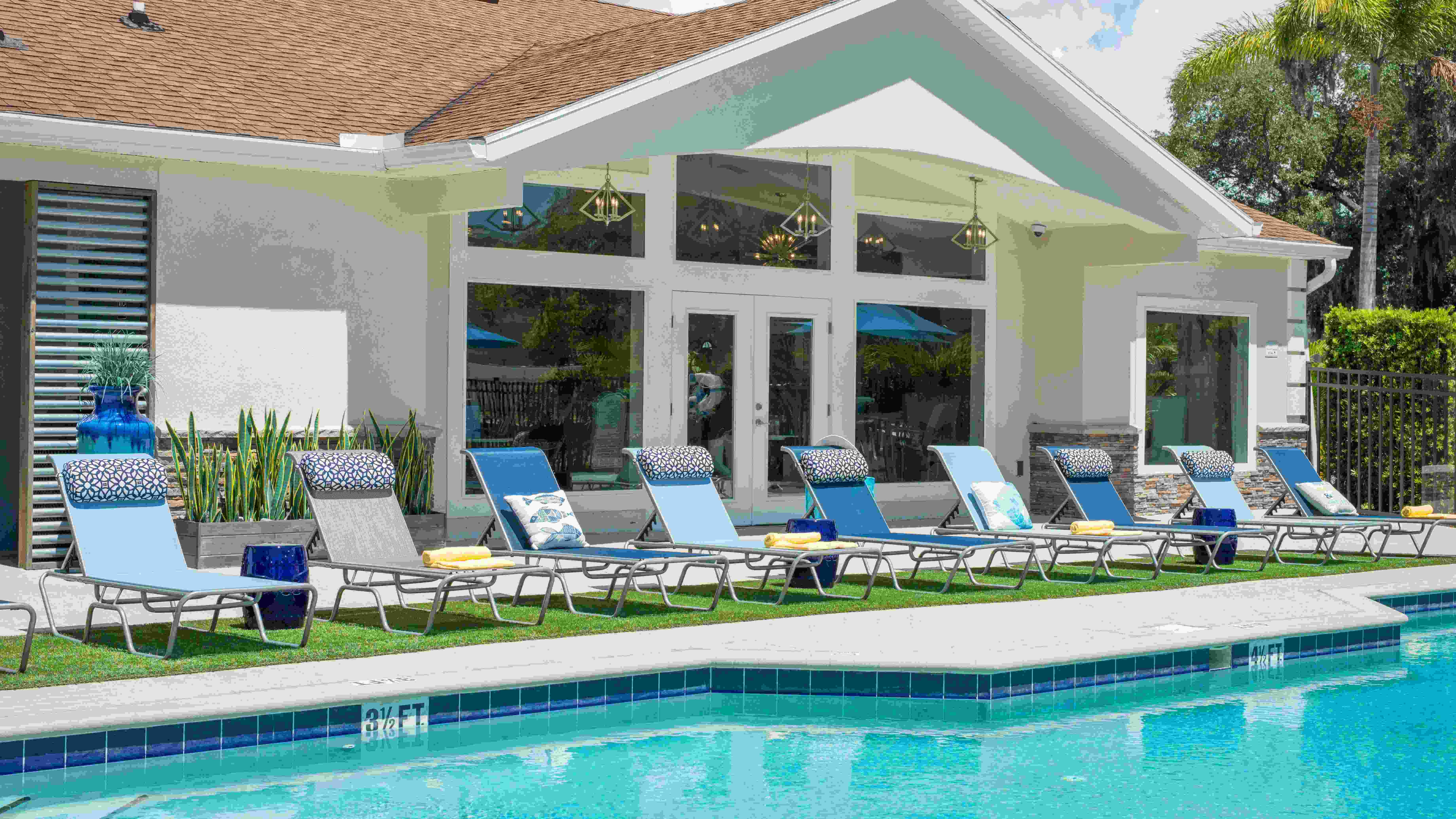  Indulge in tranquil moments lounging on our luminous pool deck. 