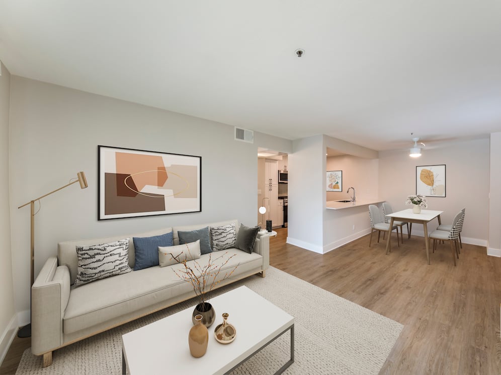 Renovated Package I dining and living room with hard surface flooring