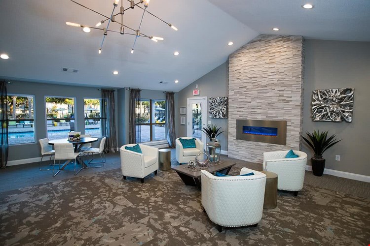 Have seat next to our fireplace in the clubhouse.