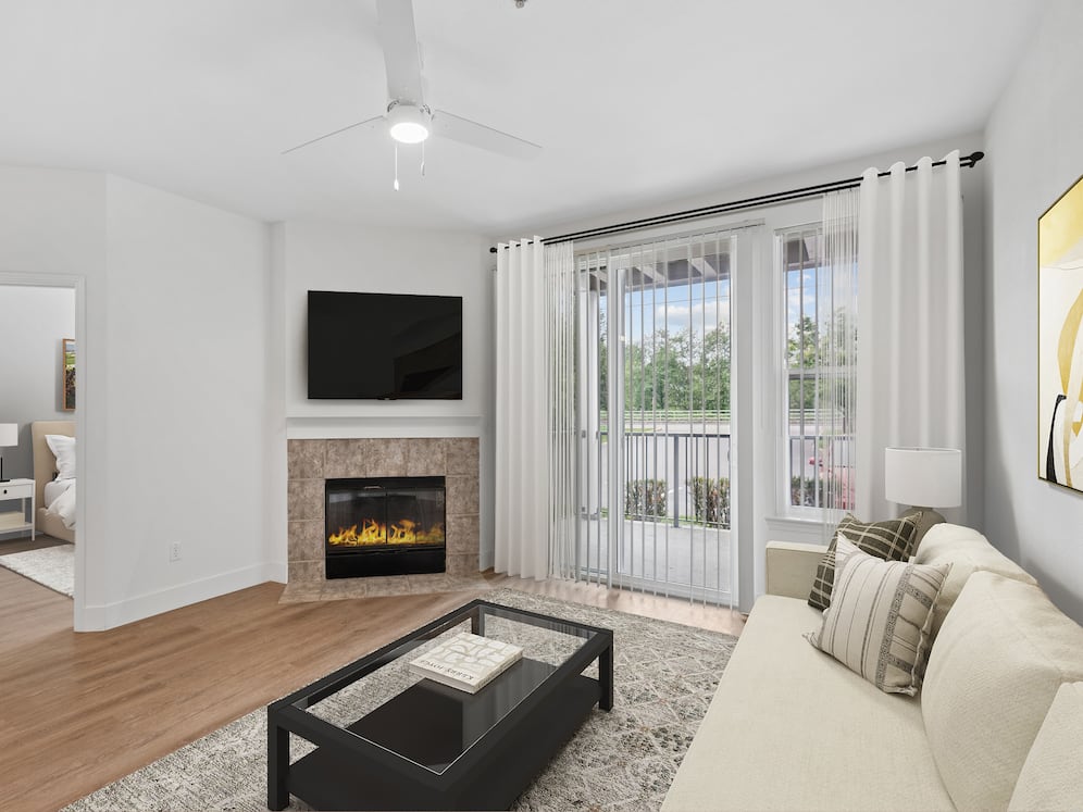 Renovated Package I living room with hard surface flooring