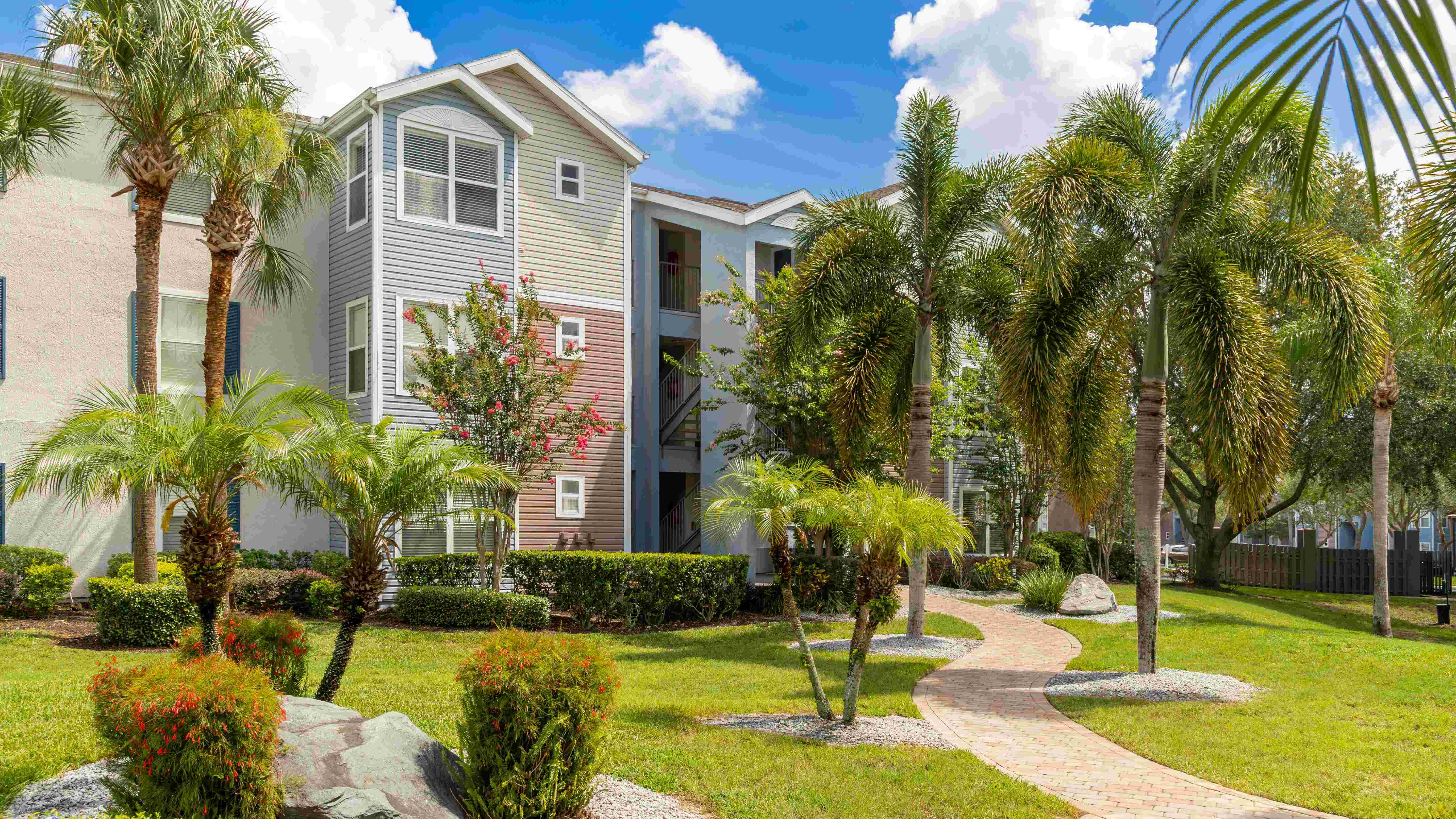 Ashton Chase offers lush, palm-lined walkways and beautifully maintained grounds—perfect for a peaceful stroll just outside your door.