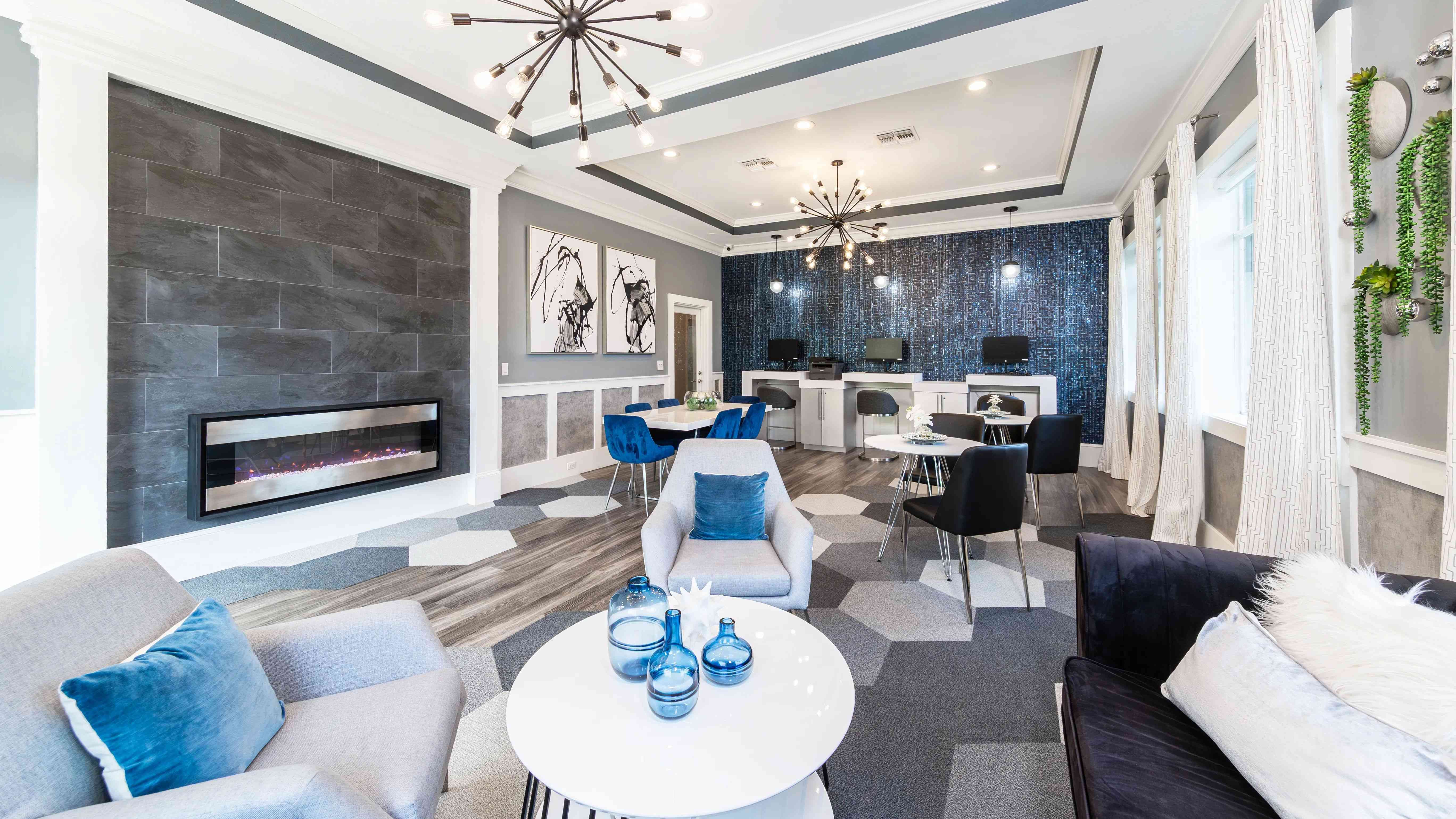 From remote work to resident events, this stylish business lounge offers workstations, plush seating, and a cozy modern fireplace, offering a great place to catch up on work.