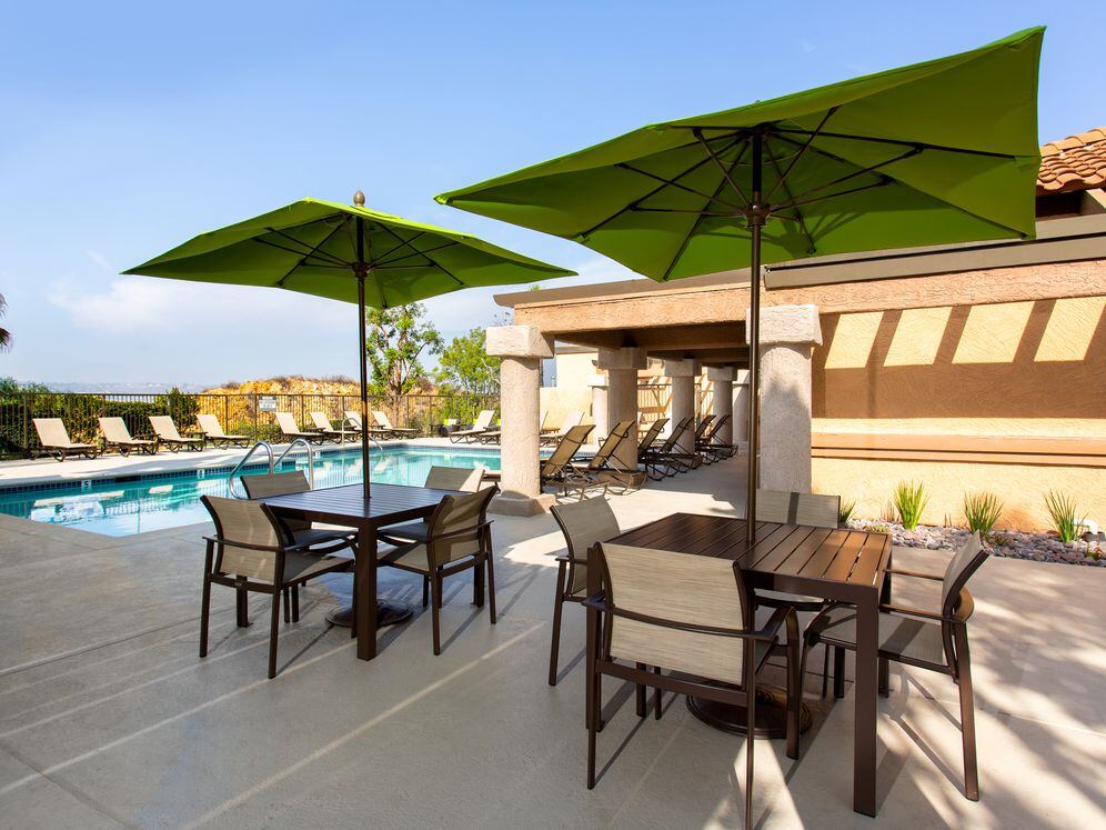 Lucera pool and sundeck with tables