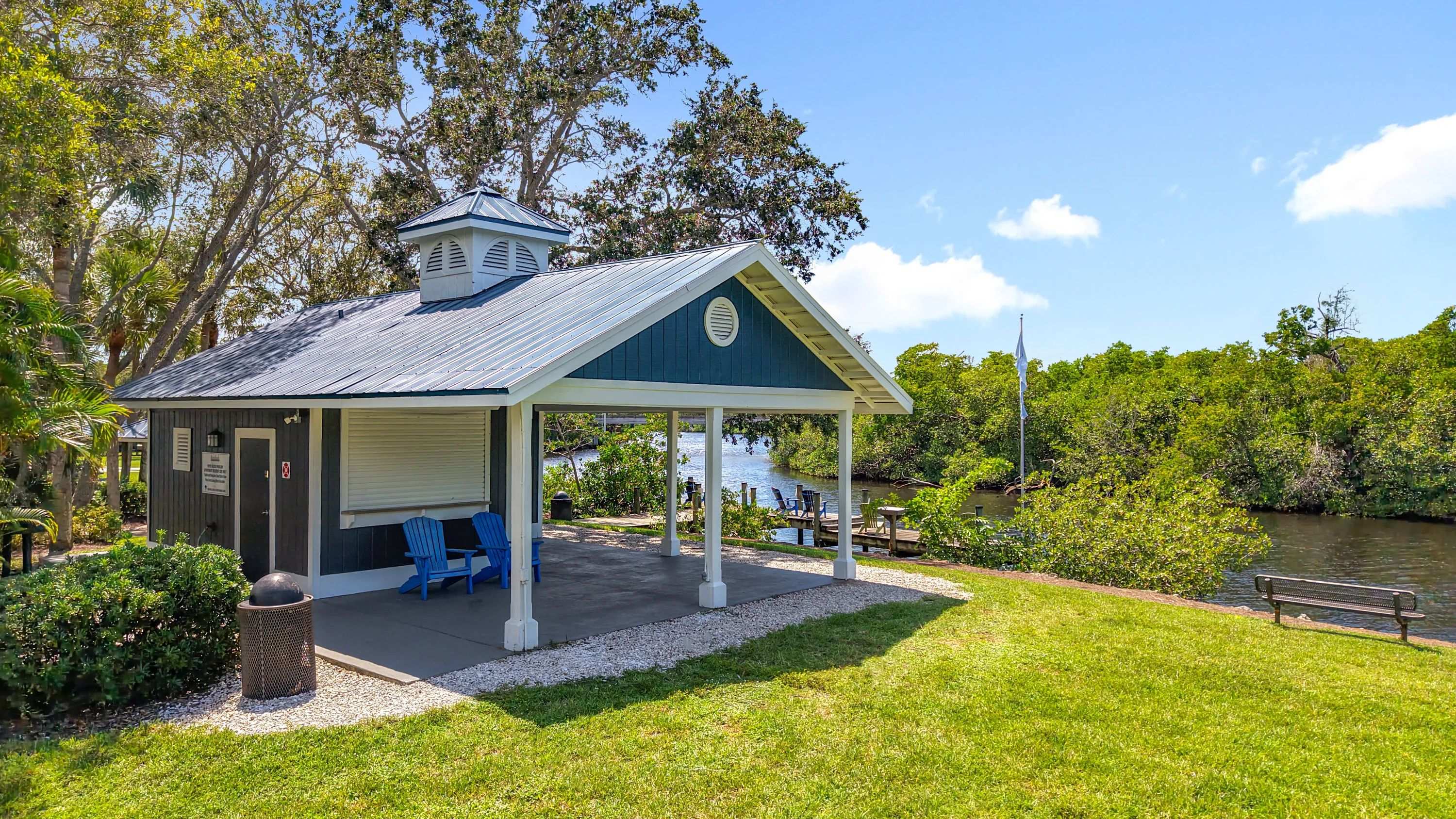 This scenic waterfront retreat at River Reach offers the perfect spot to relax, read, or connect with neighbors.
