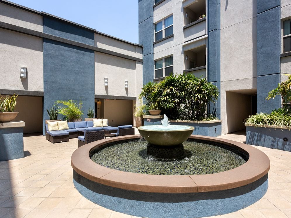 Courtyard with fountain and soft lounge seating