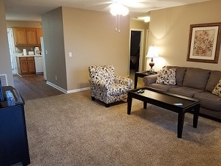 Spacious living rooms (Shown with Cort furnishings)