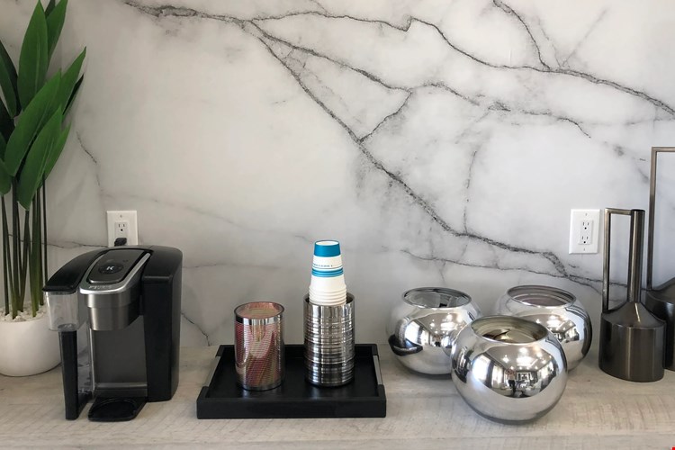Discover brewing bliss at Eagle's Pointe with our coffee bar. Sip and savor the delight of complimentary coffee in our cozy leasing office.