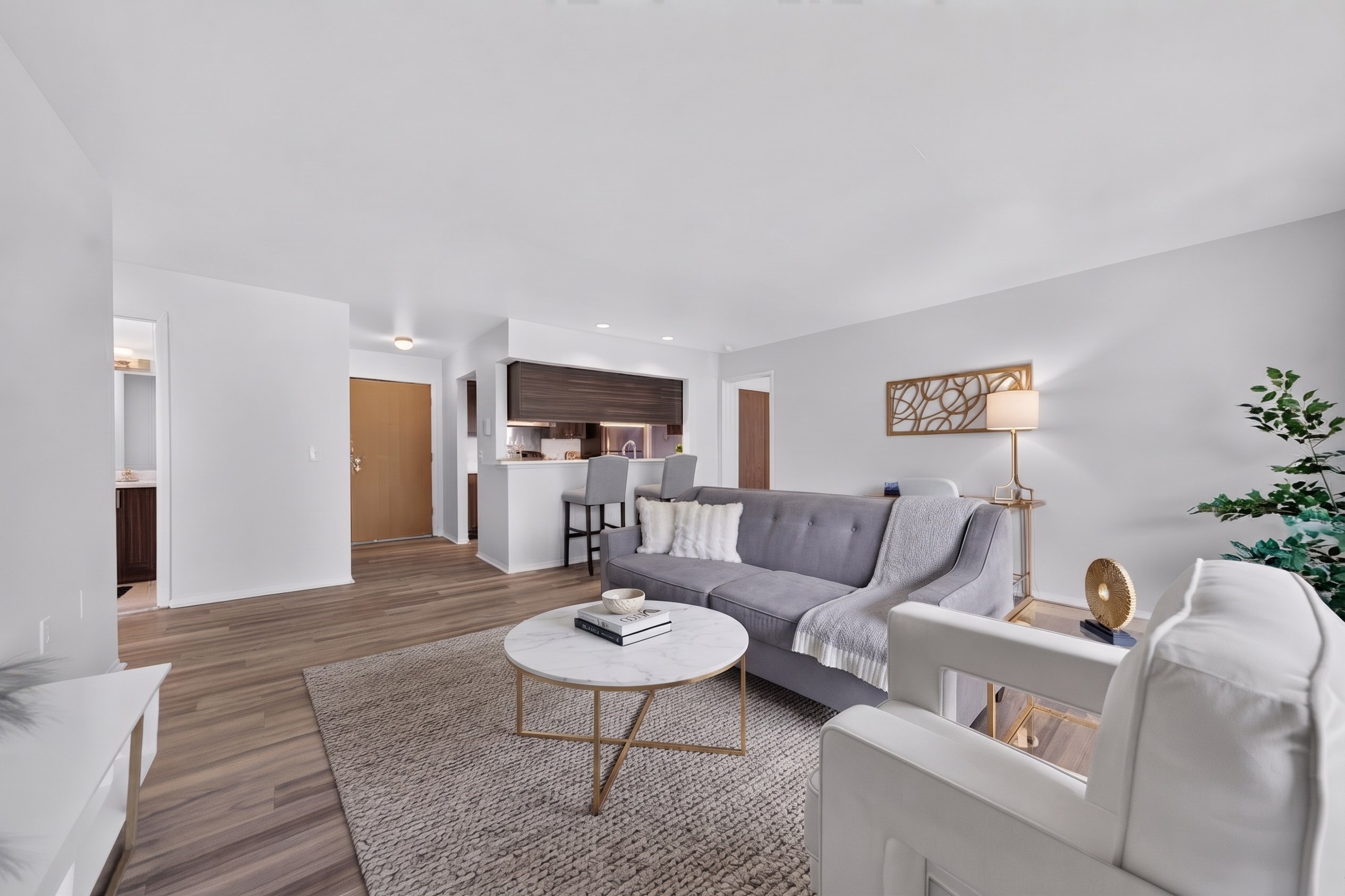 Spacious living room at Franklin River Apartments in Southfield, MI.