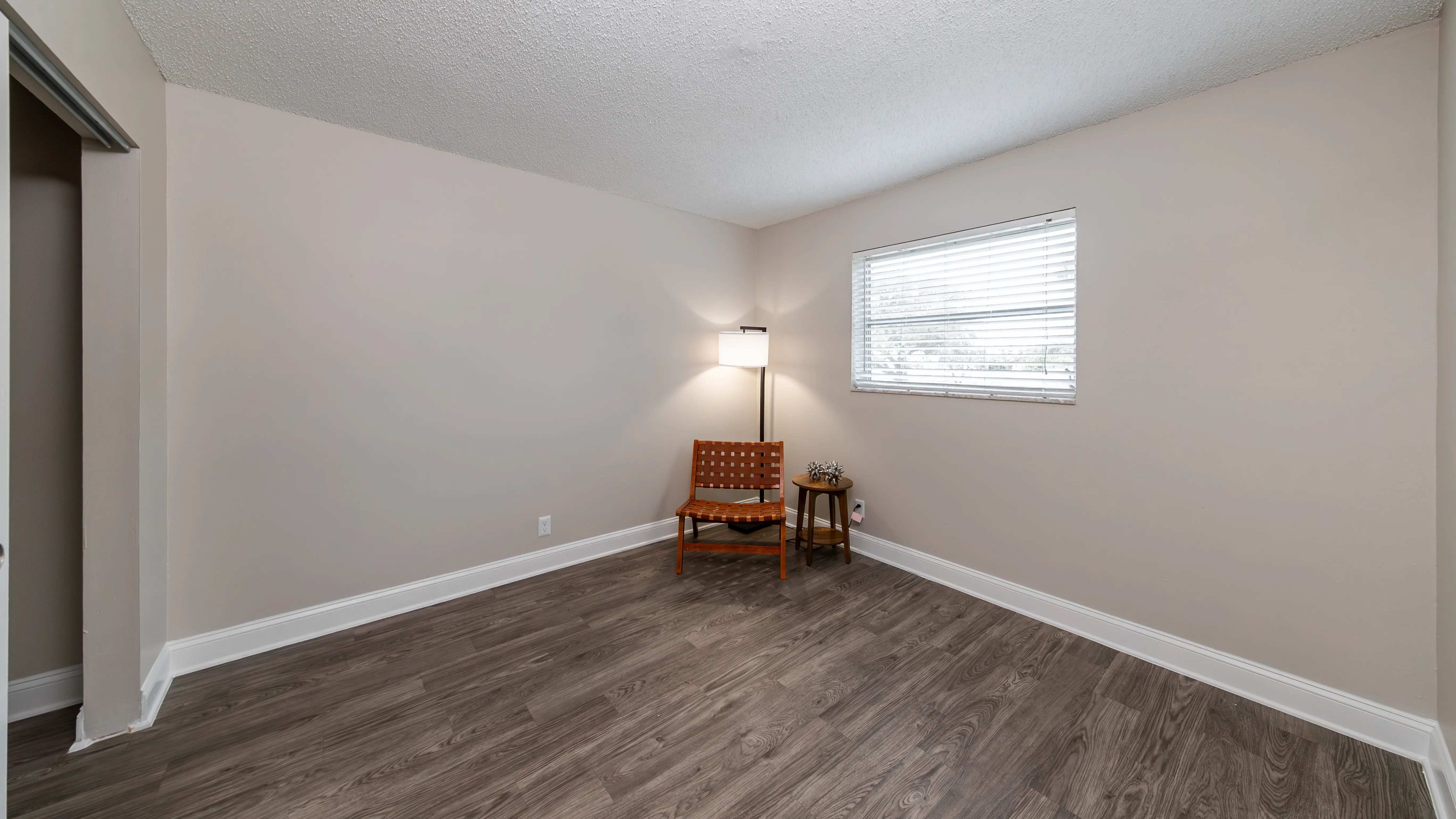 Experience pure delight in our bedrooms adorned with cozy wood-style flooring.