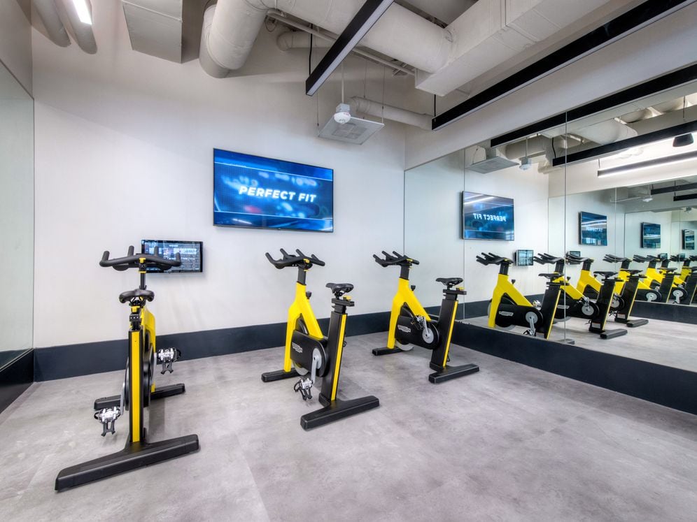 Fitness center flex studio with spin bikes and virtual fitness programming
