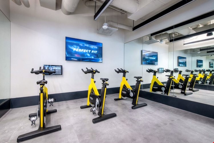 Fitness center flex studio with spin bikes and virtual fitness programming