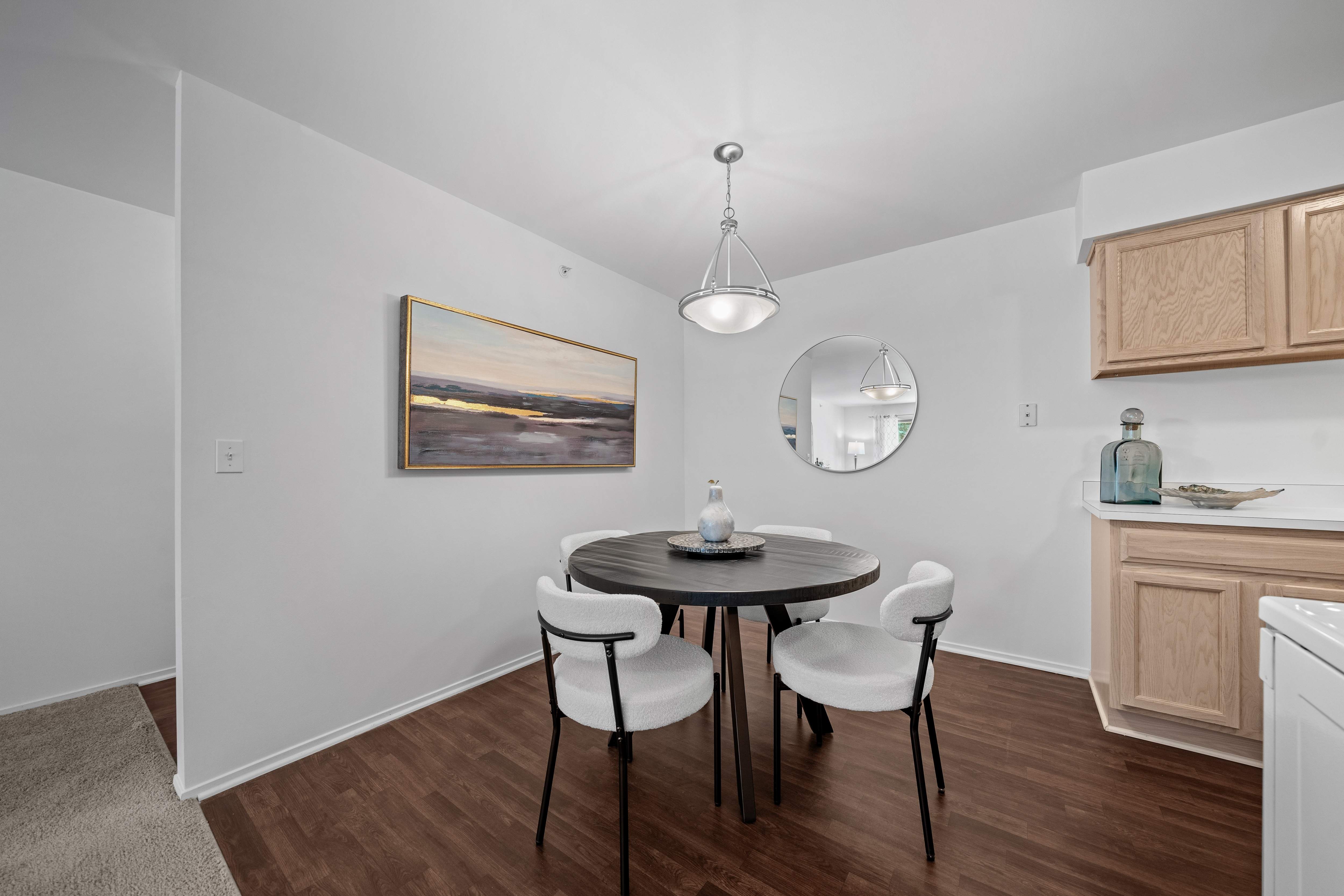Large kitchen and dining room at Prentiss Pointe Apartments in Harrison Township, MI