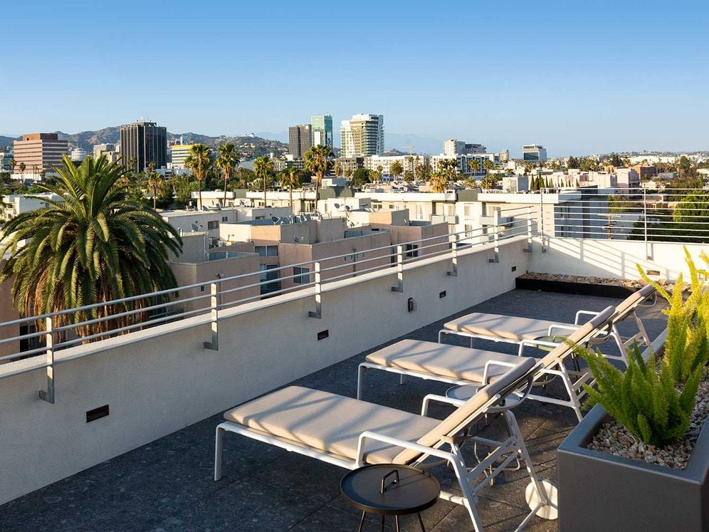 Roofdeck with lounge seating, cabanas and panoramic views